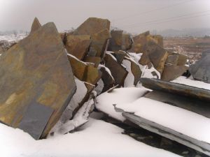 Rusty paving slate loose stone randome